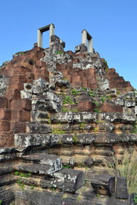 Low angle view of old building against sky