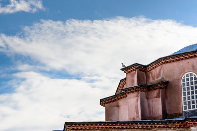 Low angle view of old building against sky