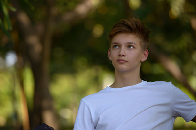 Portrait of young man outdoors