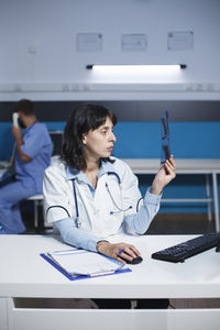 Portrait of doctor working at clinic