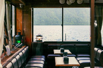 View from inside a cozy lakeside restaurant.