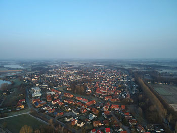 High angle shot of townscape against sky