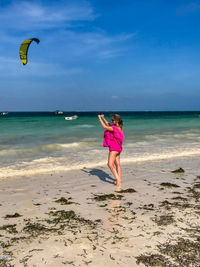 Blonde woman at kiwengwa beach