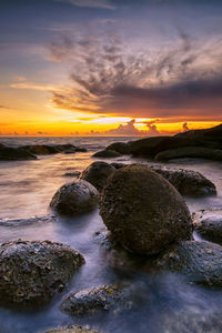 Scenic view of sea against sky during sunset