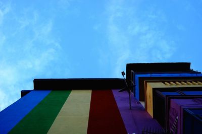 Low angle view of building against blue sky