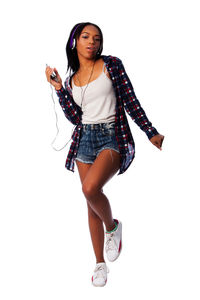 Portrait of young woman against white background