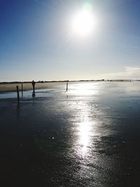 Scenic view of sea against clear sky during sunset