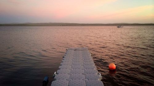 Scenic view of sea at sunset