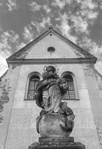 Low angle view of statue against sky