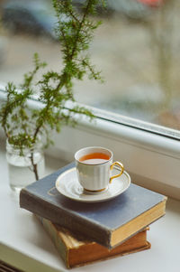 Close-up of coffee cup on table