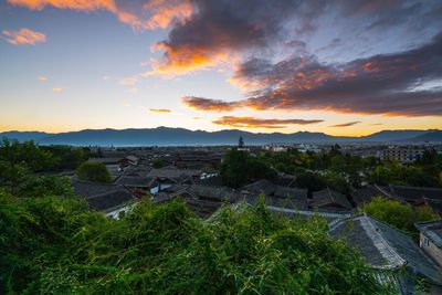 High angle view of cityscape against sky during sunset