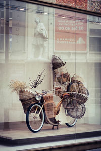 Bicycle against wall in city