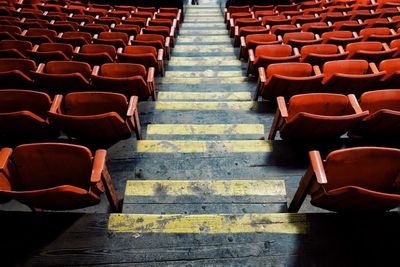 High angle view of empty chairs at stadium