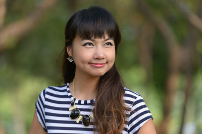 Portrait of smiling young woman