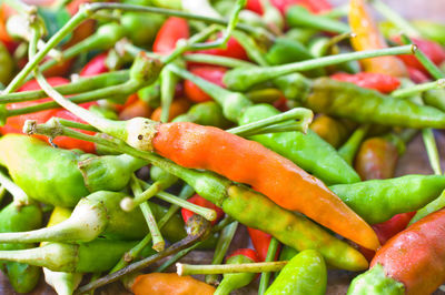 Close-up of fresh chili peppers at market stall