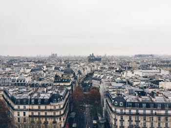 Aerial view of paris roofs and perspective, wintertime, streets and rooftops 