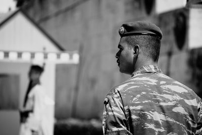 Rear view of man standing outdoors