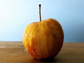 Close-up of apple on table