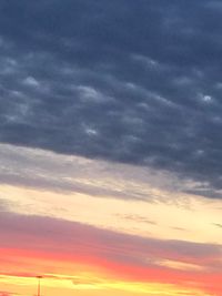 Low angle view of dramatic sky during sunset