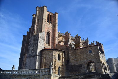 Low angle view of historic building against sky