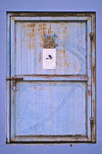 Close-up of rusty metal door