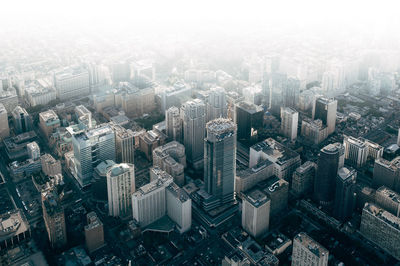 High angle view of cityscape during foggy weather