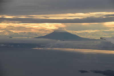 Scenic view of mountains against sky during sunset