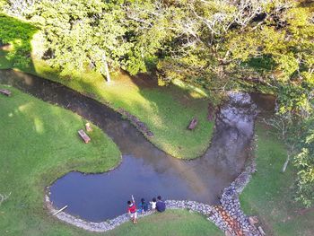 High angle view of people by lake