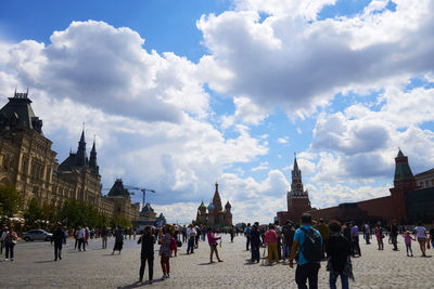 People at town square against sky