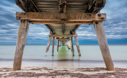 Pier over sea against sky