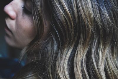 Close-up of young woman with blond hair