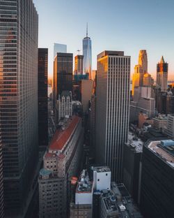 Modern buildings in manhattan during sunset