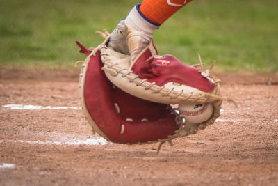 Close-up of skateboard on field