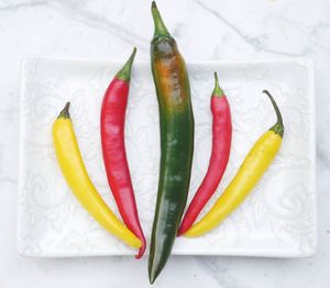 High angle view of chili peppers on table