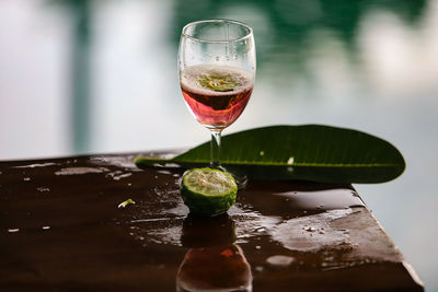 Close-up of wine glass on table