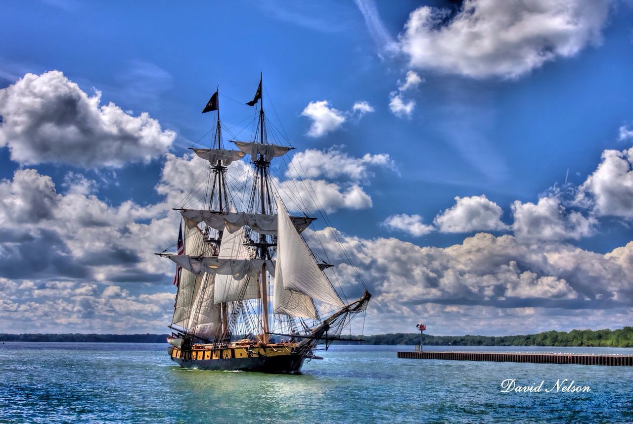 waterfront, water, sky, nautical vessel, sea, transportation, cloud - sky, mode of transport, cloud, boat, blue, sailboat, sailing, cloudy, nature, mast, tranquility, tranquil scene, day, ship