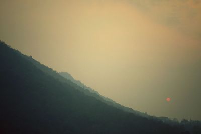 Scenic view of mountains against sky during winter