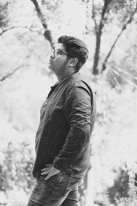 Side view of young man looking away