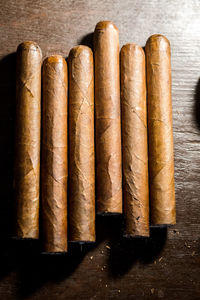 Close-up high angle view of cigars