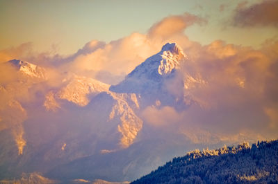 Scenic view of mountains against sky during winter