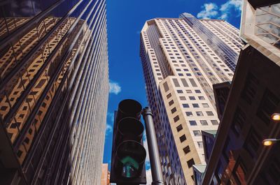 Low angle view of modern buildings against sky