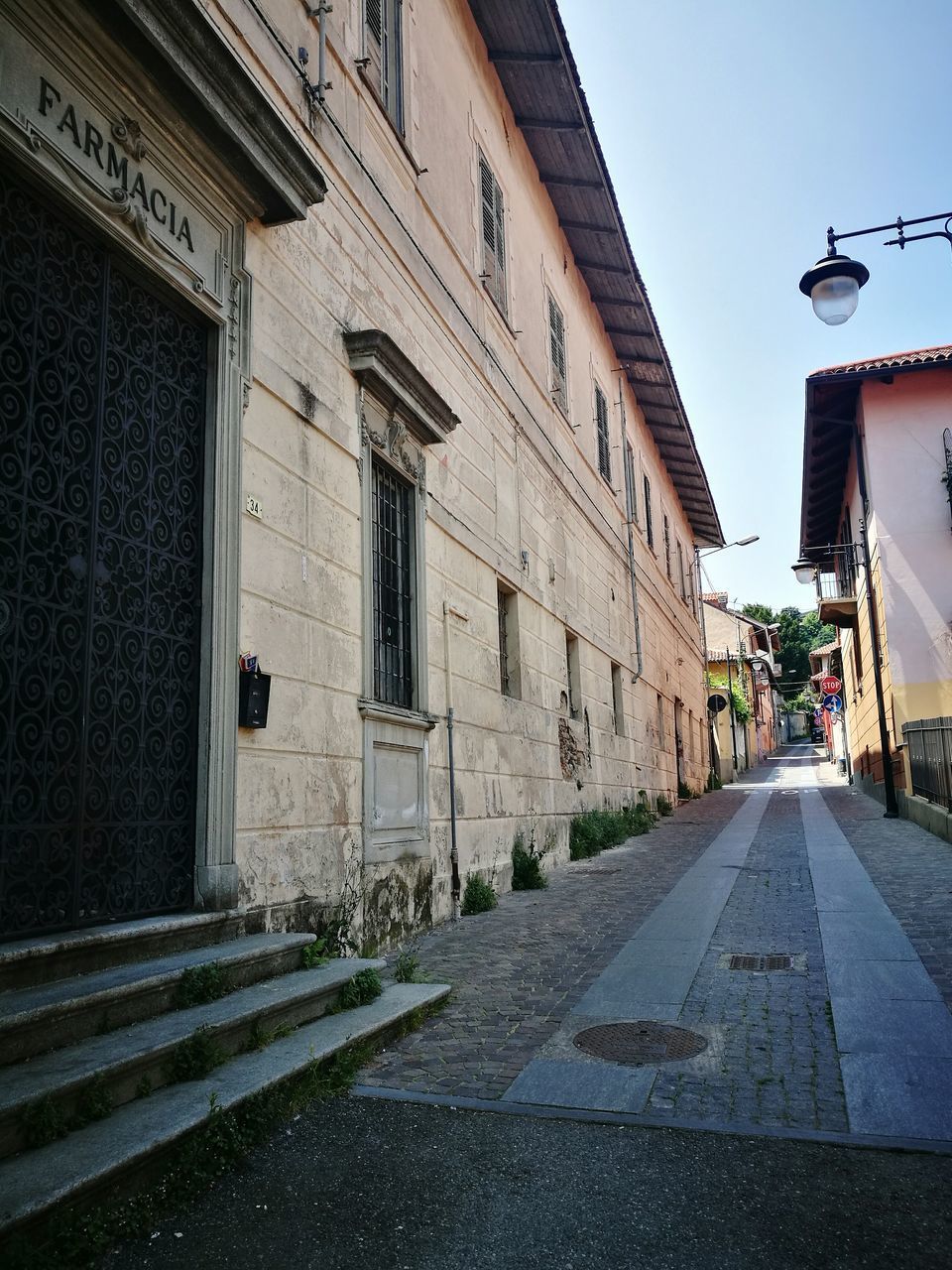 VIEW OF ROAD ALONG BUILDINGS