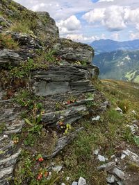 Rock formation on land against sky