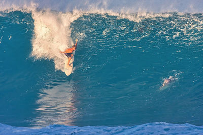 High angle view of man swimming in sea