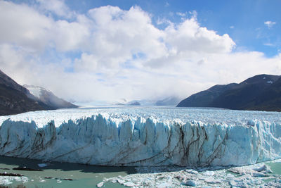 Scenic view of frozen lake against sky