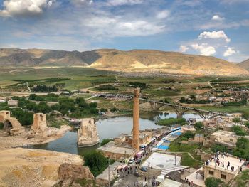 High angle view of buildings in city against sky