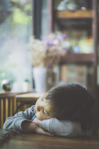 Boy sleeping at home