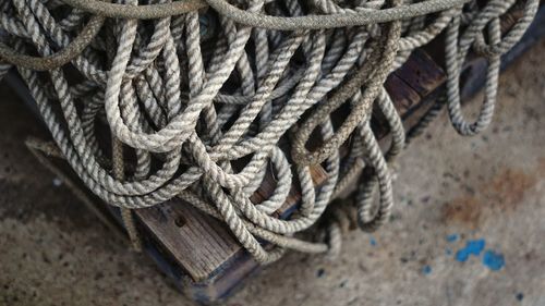 Close-up of rope tied on metal