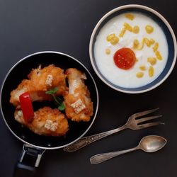 High angle view of breakfast served on table