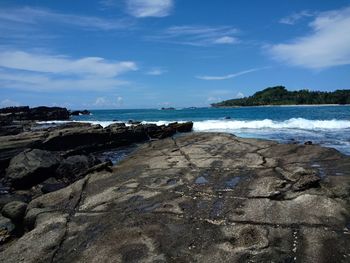 Scenic view of beach against sky